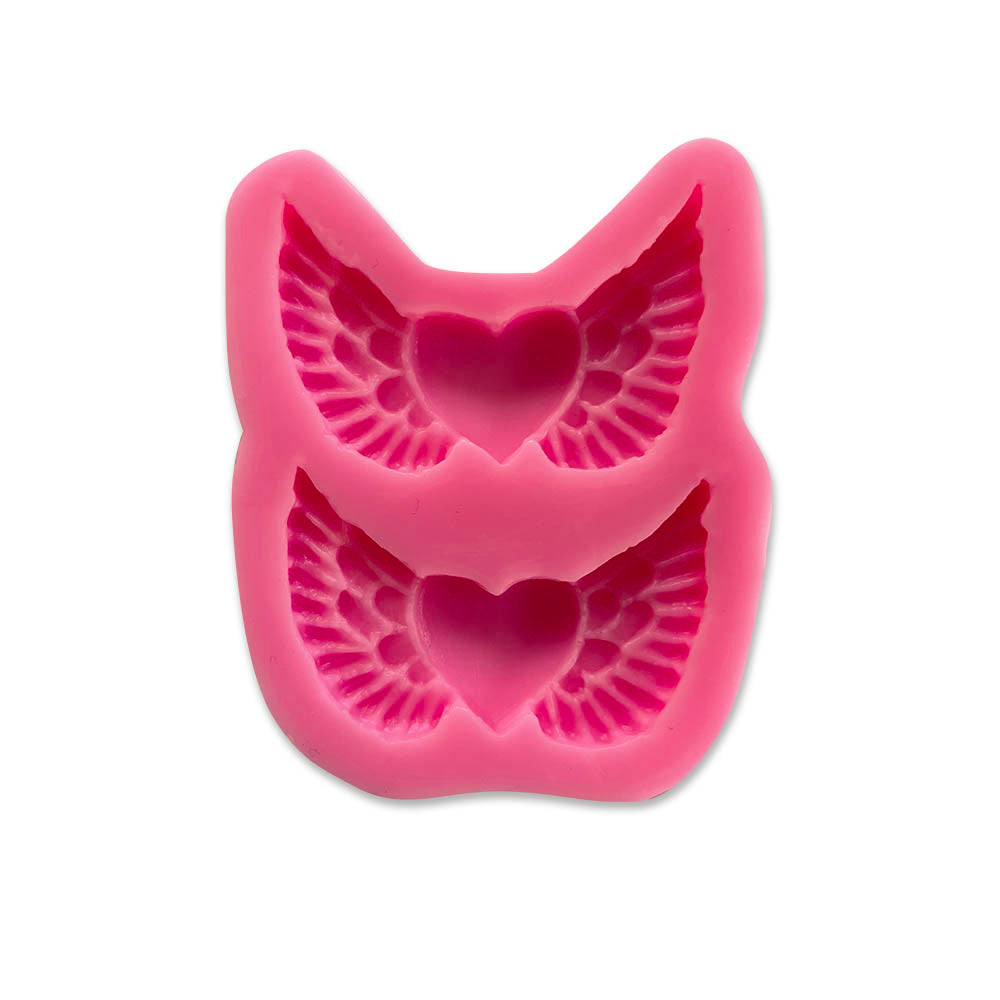 Molde dos corazones con alas